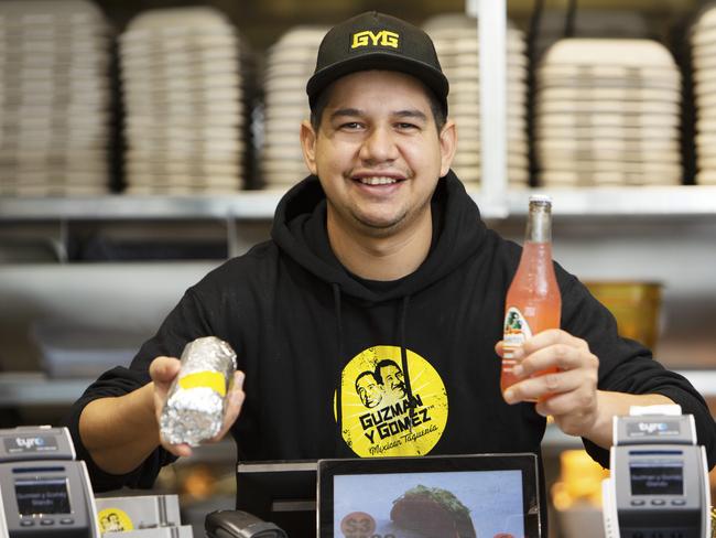 International student Miguel Reyes was able to secure a job at an OTR store where he is working in the Guzman y Gomez restaurant which means he can afford to continue to study in South Australia. Photographer Emma Brasier