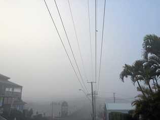 Gympie has woken to a layer of thick fog covering the region; as seen from the top of Nash St at 7.30am this morning. Picture: Frances Klein