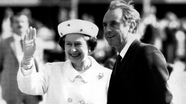 Queen Elizabeth is greeted by John Cain at Tullamarine Airport in 1988. Picture: Mark Morrisy