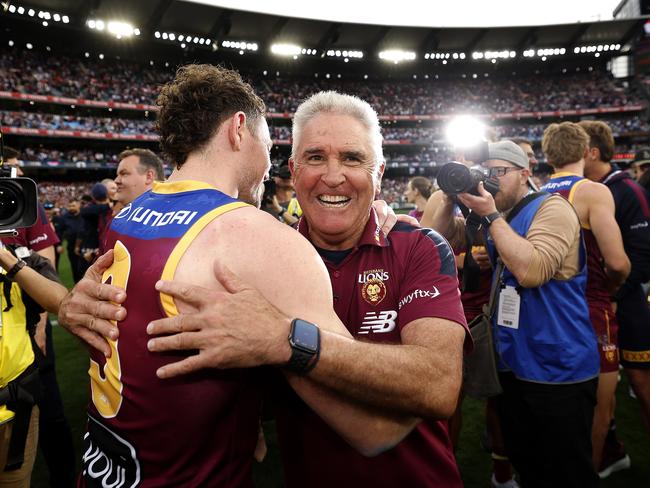 Brisbane coach Chris Fagan celebrates with Lachie Neale. Picture: Phil Hillyard