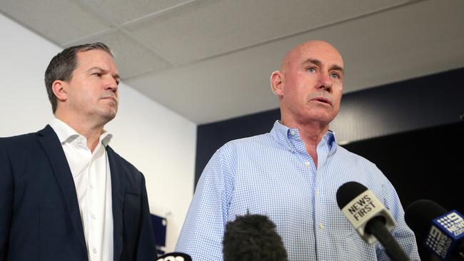 Pivotal Homes Managing Director Michael Irwin and lawyer Derek Cronin announce the demise of Pivotal at a media briefing. Picture: Richard Gosling