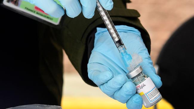 The majority of Australians should be vaccinated against COVID-19 by the end of October but that’s unlikely to mean international borders will reopen. Picture: AFP