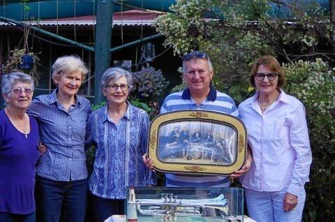 Elaine Fox accepts the donation on the behalf of the museum from Cec&#39;s children Anne Maguire, Rayleen Casanelia, Will Ryan and Patricia Stokes. Picture: Will Ryan