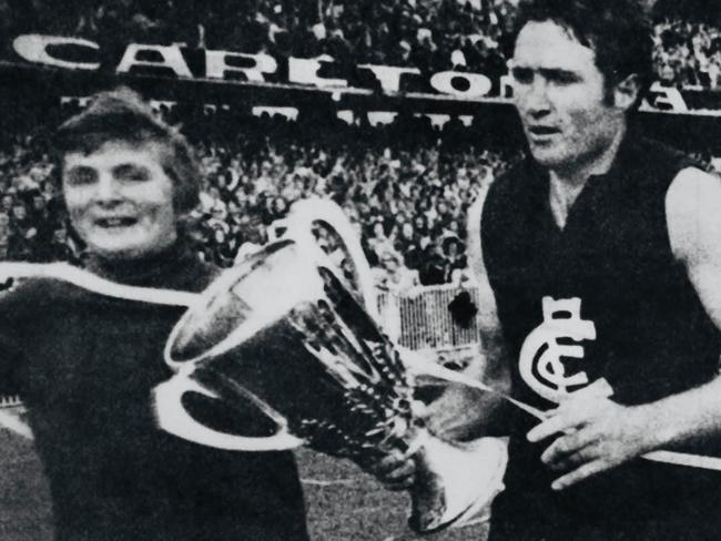 Macca, from Mount Waverley, with Carlton's John Nicholls and the VFL premiership cup in 1972.