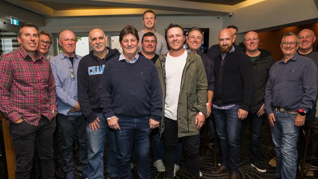 Legendary Canterbury trainer Garry Carden’s (centre, blue jumper) leaving drinks at Croydon Park Hotel. Picture: Dylan Robinson