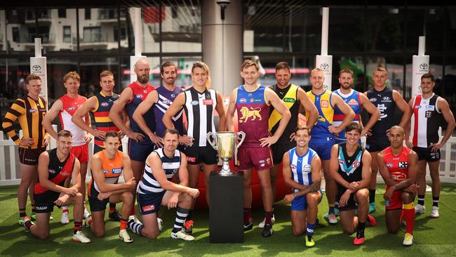 AFL captains at Marvel Stadium on Monday. Picture: Daniel Pockett/Getty Images.