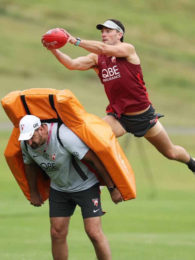 McCartin flies over Dean Cox to mark.