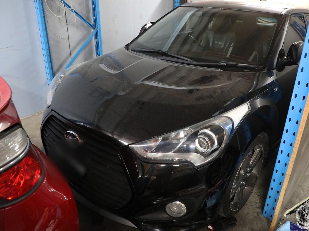 Cars seized during a police raid at Fairfield East. Picture: NSW Police