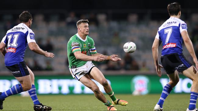 Jack Wighton of the Raiders passes the ball