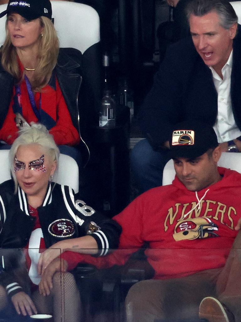 Big sports fans – Gaga and Michael (bottom row) at this year’s Super Bowl. Picture: Rob Carr/Getty