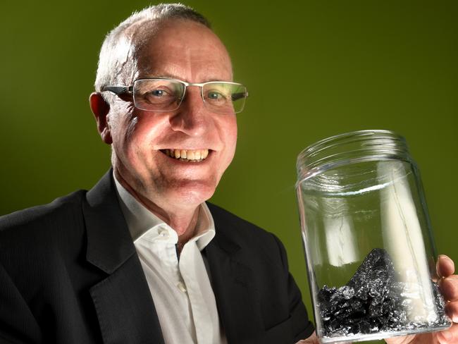 Latent Heat Storage has developed a technology that can store large amounts of electricity. Chairman Kevin Moriarty plans to list the company on the ASX soon. Kevin is pictured with pure silicon. Pic: Tricia Watkinson