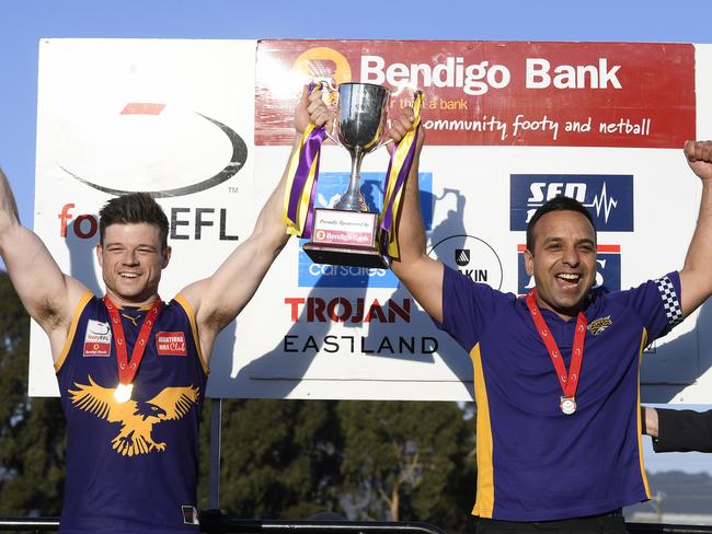 Vermont captain Lachlan Johns and coach Harmit Singh show off the silverware. Picture: Andy Brownbill