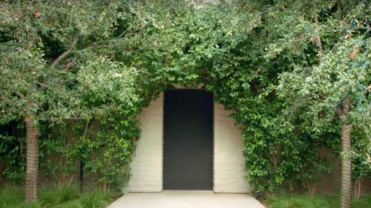 The outdoor space features a number of secret doors. Picture: Vogue/YouTube