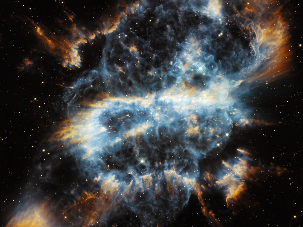 In this striking image of the planetary nebula NGC 5189 the intricate structure of the stellar eruption looks like a giant and brightly coloured ribbon in space.