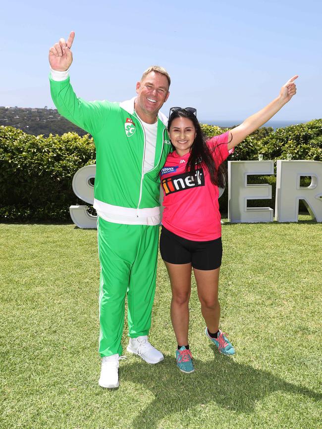 Shane Warne with the best female KFC SuperCoach in NSW, Deniz Morali. Picture: Brett Costello