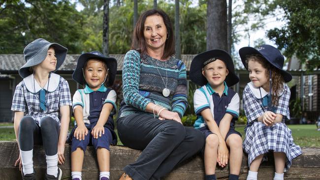 Principal Yvonne Rinaldi with students Charlotte Barrett 6, Victoria Lee 5, Casper Tennant 5, and Ruby Messinbird-Shellard 7, at Caboolture Montessori School. Picture: Lachie Millard