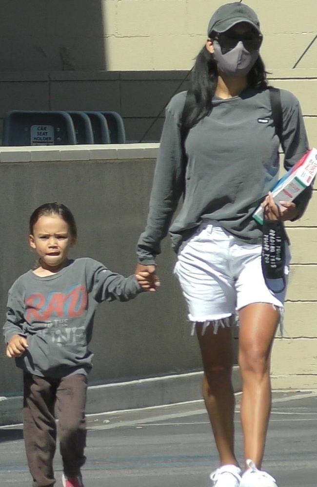 Naya Rivera shopping with her son Josey Hollis. Her face mask read: “If you are reading this you are too close!” Picture: Backgrid.