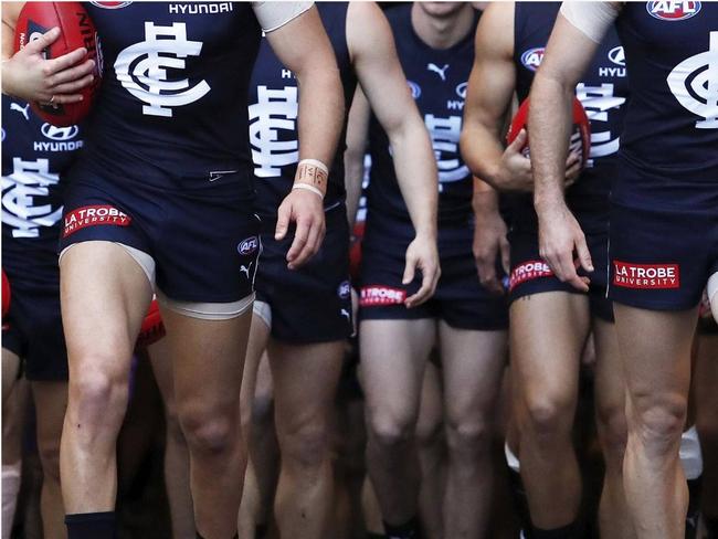 AFL player’s future in doubt over vax stance