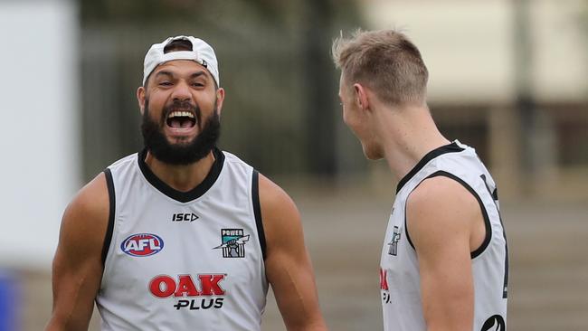 Paddy Ryder has a laugh with Todd Marshall at training. Picture: TAIT SCHMAAL