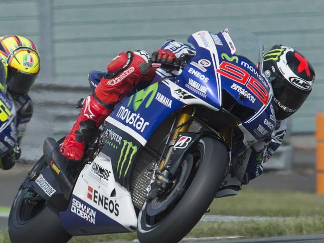 HOHENSTEIN-ERNSTTHAL, GERMANY - JULY 11: Jorge Lorenzo of Spain and Movistar Yamaha MotoGP leads Valentino Rossi of Italy and Movistar Yamaha MotoGP during the MotoGp of Germany - Free Practice at Sachsenring Circuit on July 11, 2014 in Hohenstein-Ernstthal, Germany. (Photo by Mirco Lazzari gp/Getty Images)