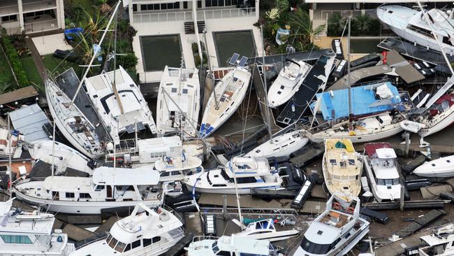 Ten year anniversary of Cyclone Yasi. Severe Tropical Cyclone Yasi 2011. Port Hinchinbrook aerial view of luxury yachts and boats that bore the brunt of the destructive winds and storm surge. Picture: Evan Morgan