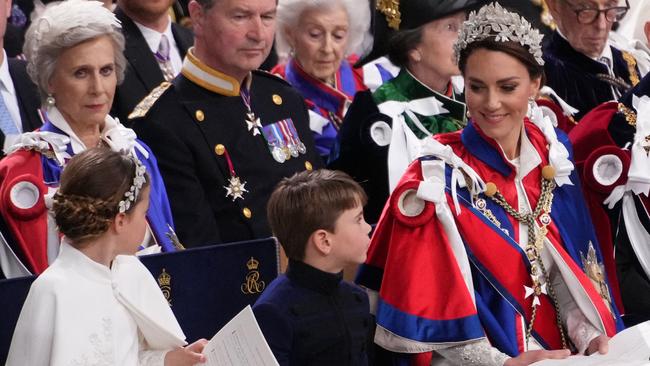 She wore pearl-and-diamond drop earrings once belonging to her late mother-in-law, Princess Diana. Picture: AFP