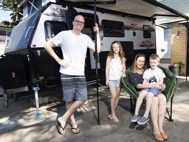 James and Rebecca Fletcher posing with their kids Hamish and Olivia. Picture: AAP Image/Attila Csaszar