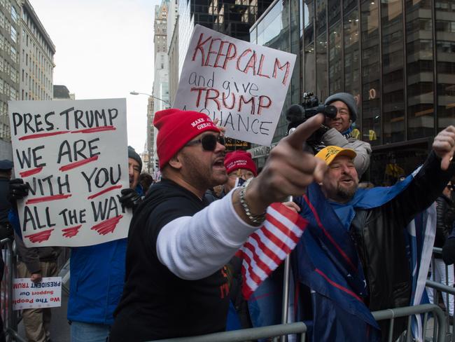 Supporters of US President Donald Trump yell at anti-Trump protesters at a rally near Trump Tower in New York. Picture: AFP/Bryan R. Smith
