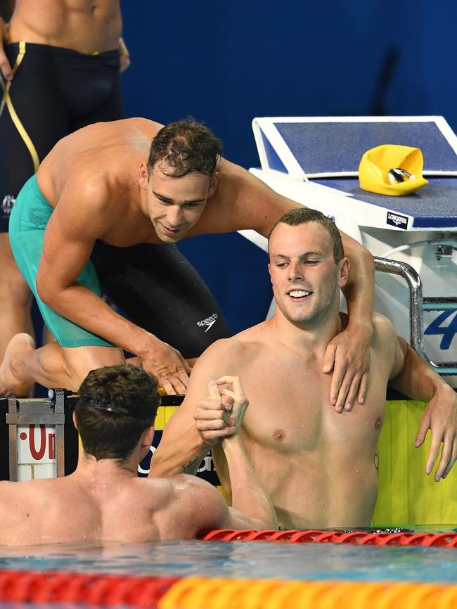 Kyle Chalmers of Australia celebrates victory with team mates Mitch Larkin and Grant Irvine. Picture: Getty Images.