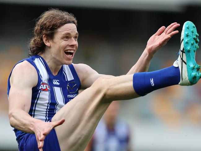 AFL Round 8 . 25/07/2020.   North Melbourne vs Carlton at the Gabba, Brisbane.  Ben Brown of the Kangaroos kicks a 1st qtr goal . Pic: Michael Klein