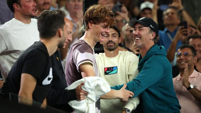 Sinner celebrates his Australian Open win with his entourage last January. Picture: Getty Images