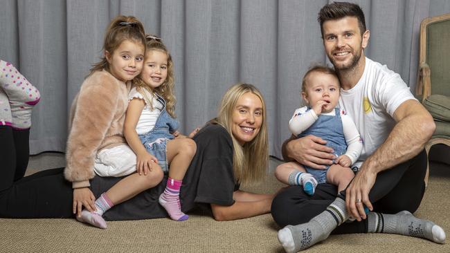 Trent Cotchin with his wife Brooke and their kids after launching the Posisocks brand. Picture: Tim Carrafa