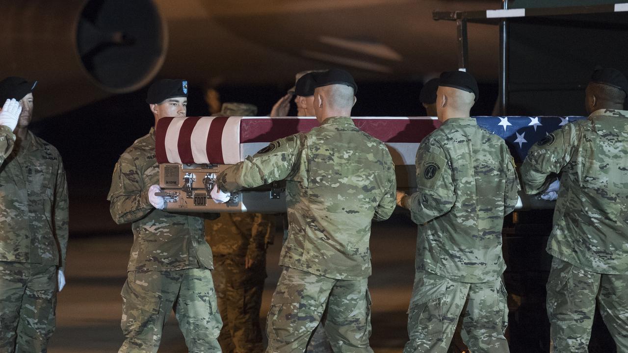 An Army carry team moves the remains of Sgt. 1st Class Elis Barreto Ortiz who was killed in action in Kabul. Picture: AP