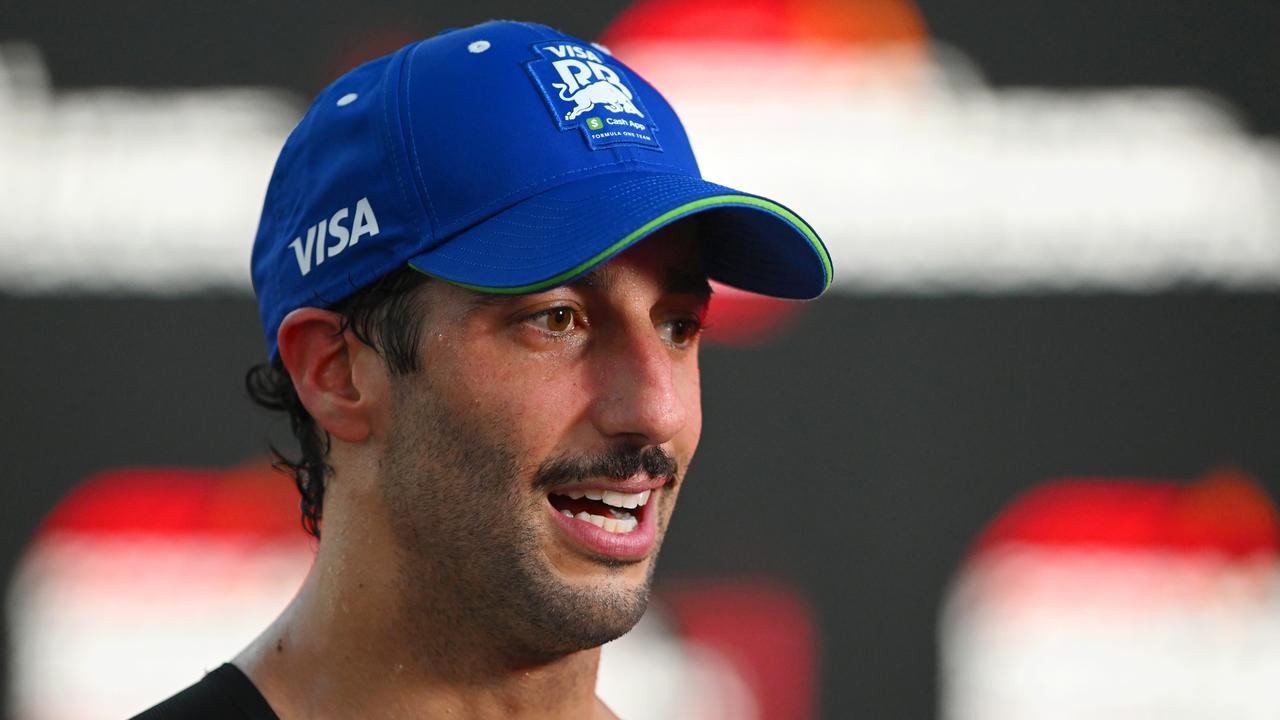 SINGAPORE, SINGAPORE - SEPTEMBER 22: 18th placed Daniel Ricciardo of Australia and Visa Cash App RB speaks to the media after the F1 Grand Prix of Singapore at Marina Bay Street Circuit on September 22, 2024 in Singapore, Singapore. (Photo by Rudy Carezzevoli/Getty Images)