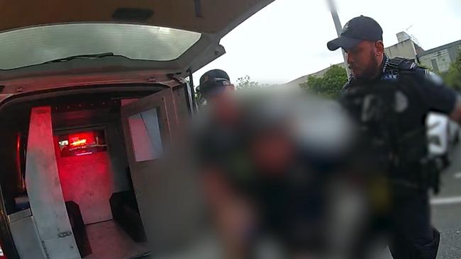Police arrest a man who allegedly robbed a Lake St tobacco shop before being taken out by a pair of tradies before officers arrived on the scene. Picture: QPS