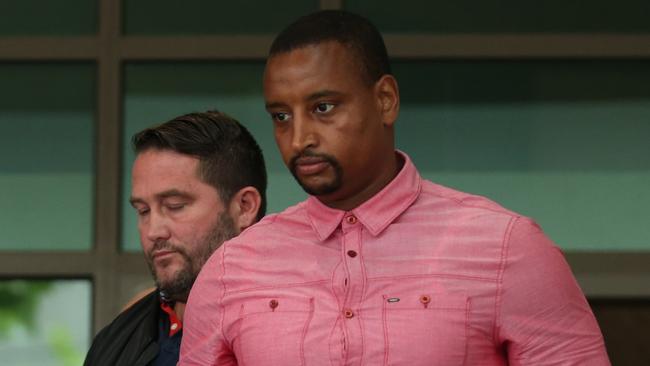 Khallid Baker leaves at the Melbourne Magistrates Court in Melbourne.