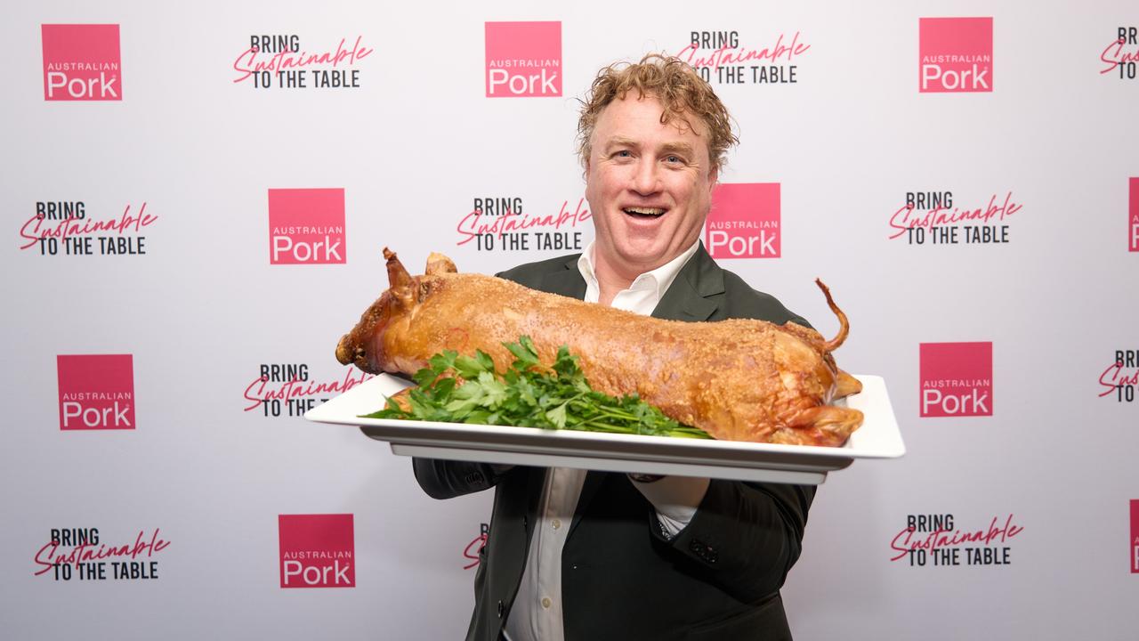 Celebrity chef Adrian Richardson with a suckling pig.