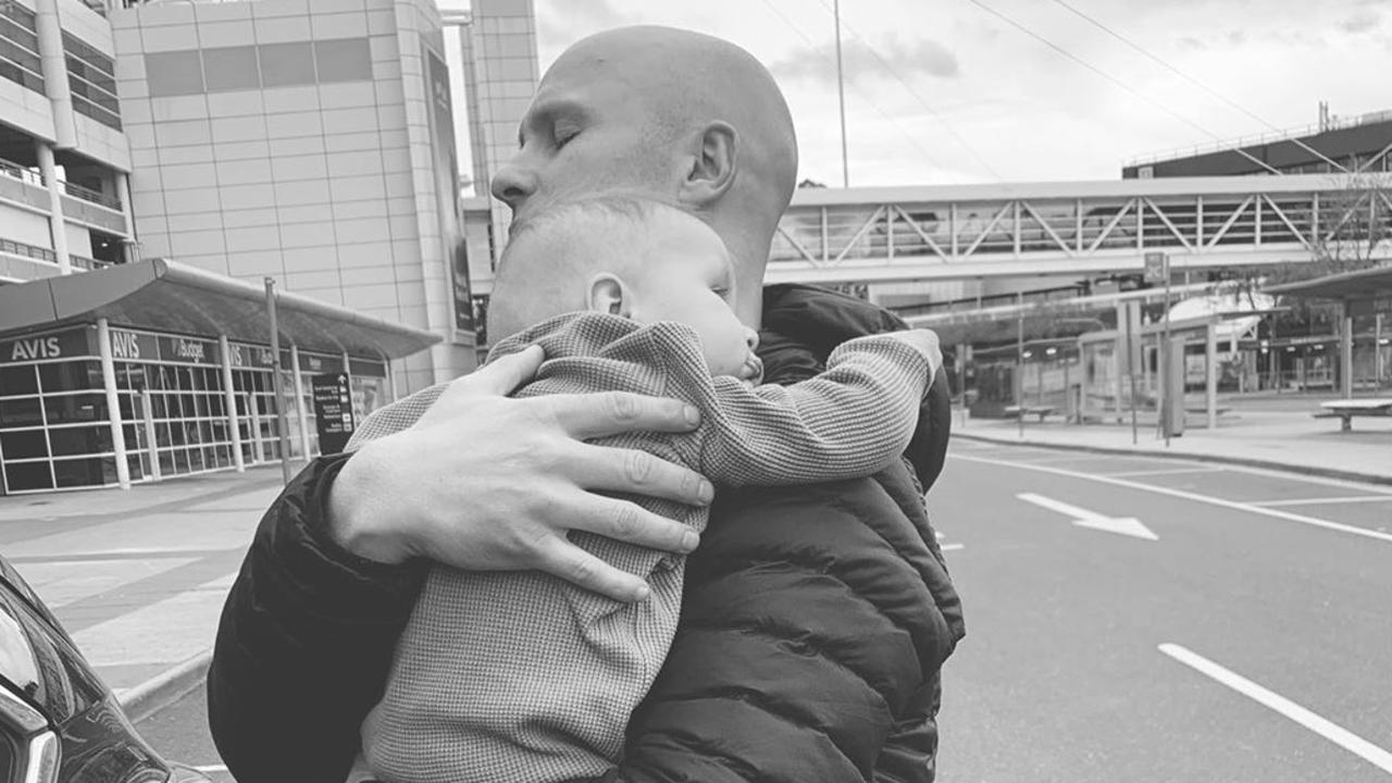 Gary Ablett Jr hugs his young son Levi on his return to Melbourne this weekend. Photo via Jordan Ablett's Instagram.