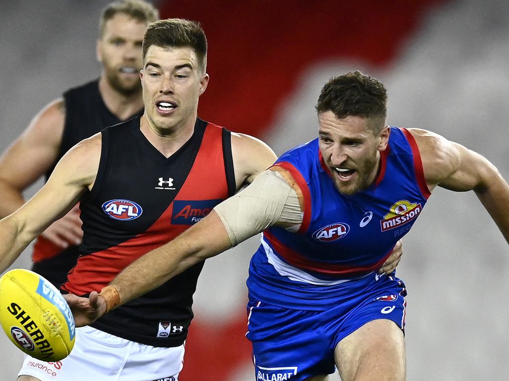 Zach Merrett (L) and Marcus Bontempelli (R) were among the most prolific users of the footy for their respective sides. (Photo by Quinn Rooney/Getty Images)