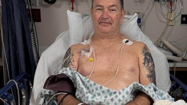 Ian Price in hospital after being diagnosed with stage four colorectal cancer.