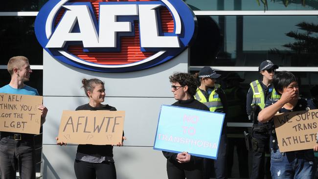 Protesters demonstrate outside AFL House after transgender people were banned from entering the AFLW draft.