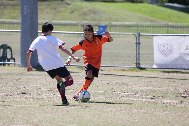 The Premier Invitational football tournament on the Gold Coast. TSS v Brisbane Roar under-13s in action. Picture: Mike Batterham.