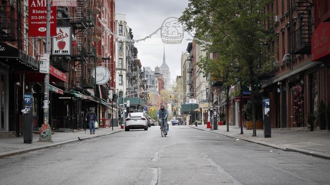 An empty Mulberry Street in the normally bustling tourist district of Manhattan’s Little Italy remains closed due to social distancing restrictions, Monday, April 27, 2020. Picture: John Minchillo.