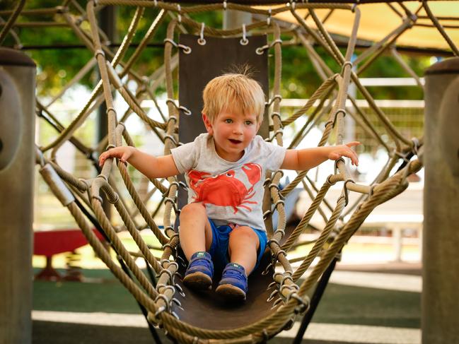 Hamish Speed 3 as Darwin council reopen's their playgrounds around Darwin.Picture GLENN CAMPBELL