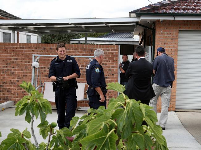 Police at the then-Haouchar family home in Merrylands in 2015.