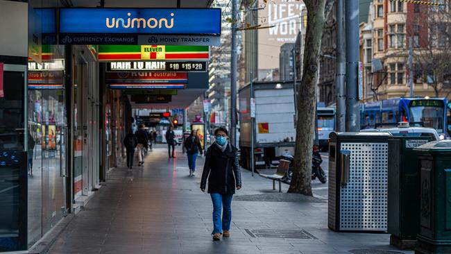 Elizabeth St on Thursday. The normally bustling heart of Melbourne is almost deserted. Picture: Getty