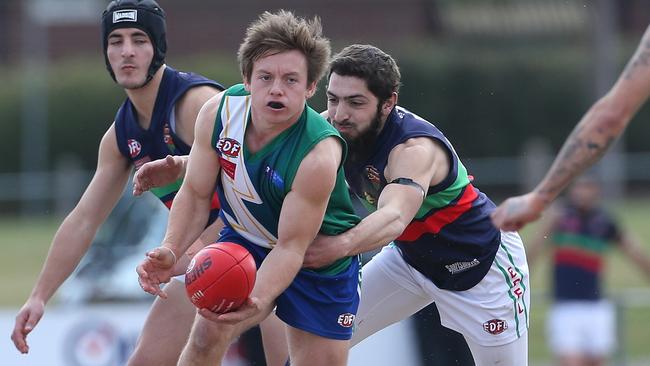 Bilal Allouch lays a tackle for Northern Saints. Picture: Hamish Blair