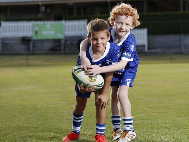 Fred Oakhill, 6, and Donnchadh O Cinneide, 6, at Valleys Diehard Rugby League Club in Brisbane. Picture: AAP/Josh Woning