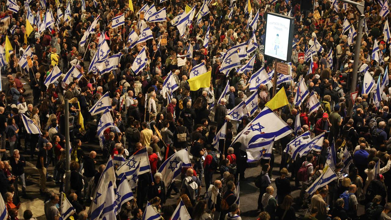 Israelis demonstrate in Jerusalem after the dismissal of the defence minister. Picture: AFP