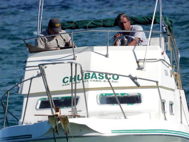 A security boat with a Mexican policeman (sitting next to the boat driver) patrols the ocean off the beach at the exclusive resort. Picture: News Corp Australia